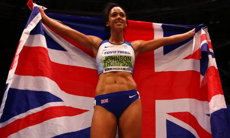 Johnson-Thompson-with-flag_IAAF_Worlds-Getty-for-IAAF