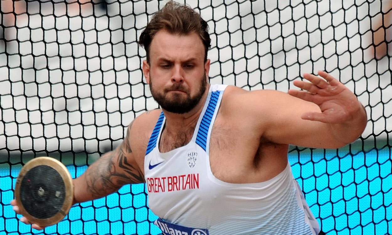 Aled Davies retains world discus title with record throw AW
